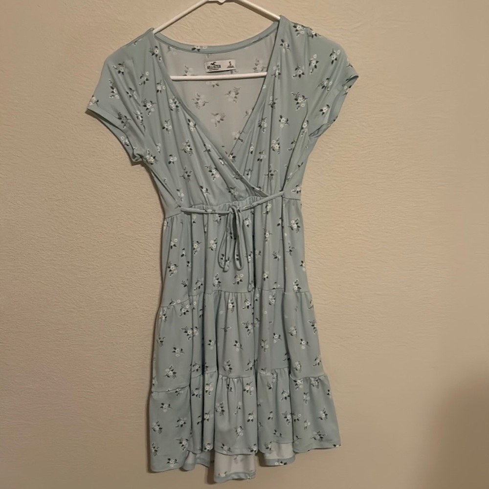 Pastel green dress with a white flower pattern